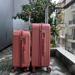 Vali kéo du lịch nhựa ABS/PC màu Hồng Đất cao cấp, hiện đại , khóa TSA bảo mật – CT01