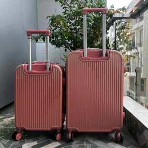 Vali kéo du lịch nhựa ABS/PC màu Hồng Đất cao cấp, hiện đại , khóa TSA bảo mật – CT01